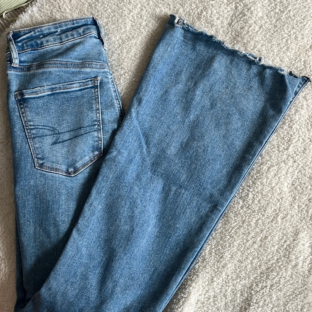 Ripped flare jeans